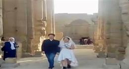سائح صيني يحتفل بزفافه في معبد الأقصر بالزغاريد  «صور» 