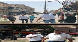 تكثيف أعمال التشجير ورفع الإشغالات بأحياء الوراق وإمبابة لتحسين المظهر الحضاري